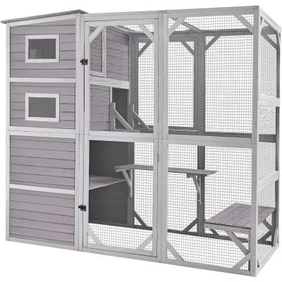 Metal outdoor animal enclosure, large pet cage with multiple levels and shaded areas for cats or small animals.