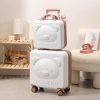 Cute bear suitcase with wheels and pink handle, perfect for children and travel, displayed in a stylish room decor setup.