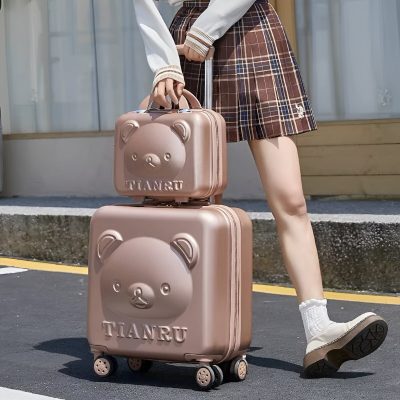 Pink bear-shaped luggage set for travel, kids school bags, cute children's trolley suitcase, toddler carry-on with wheels, durable and lightweight travel accessories for children.