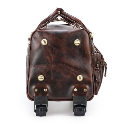 Back view of stylish brown leather optometry carrying bag with wheels for optical store professionals and customers.