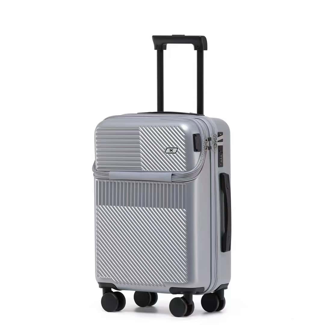 Light gray hard-shell travel suitcase with four wheels and extendable handle, designed for stylish and durable luggage travel needs.