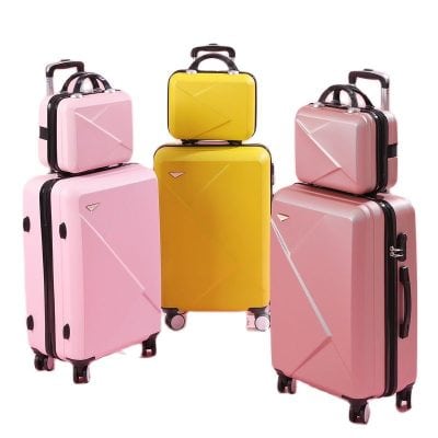 Pink and yellow hard-shell suitcases with wheels, handles, and modern design, ideal for travel and storage solutions available at Monalisa Store.