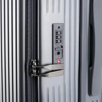 Kiosk lock on silver vertical emergency exit door with keypad lock for security and safety.