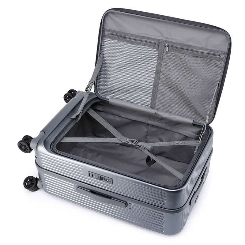 Light gray hard-shell suitcase with interior packing straps and mesh compartments, ideal for travel and cosmetic storage from Monalisa Store.
