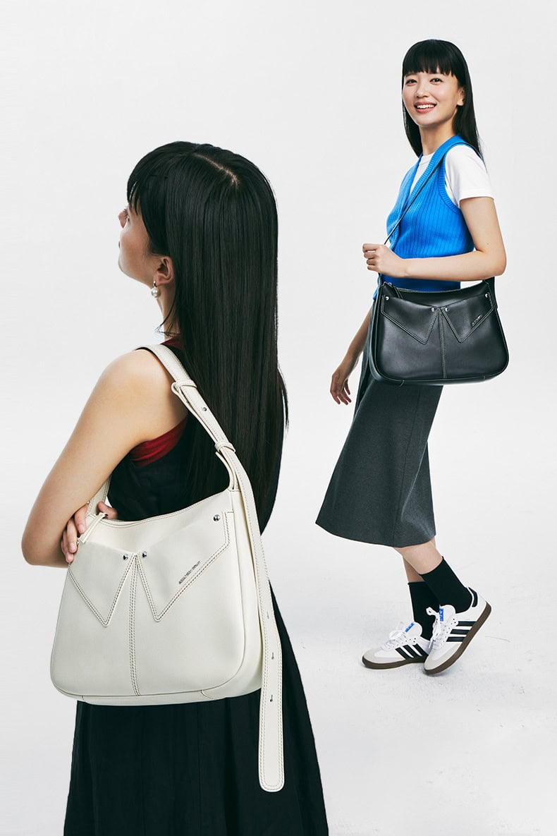 Elegant women wearing stylish handbags from Monalisa Store, perfect for fashion conscious individuals seeking high-quality designer bags.