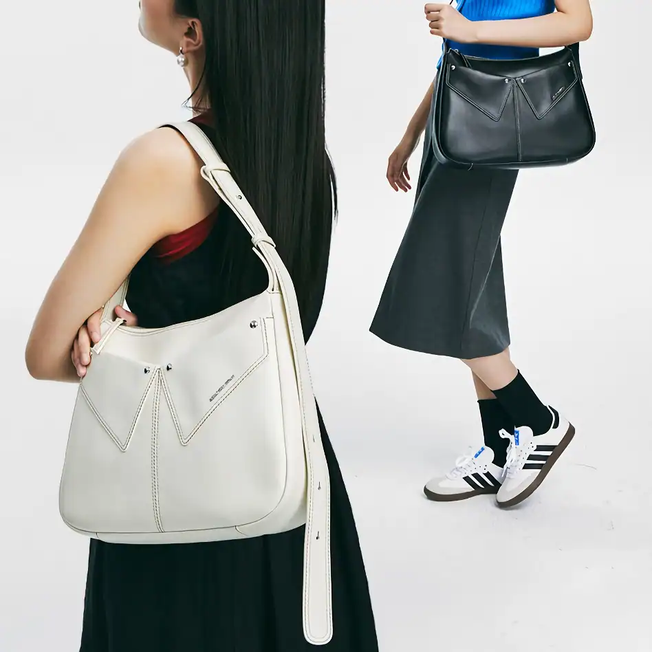 Stylish women with Monalisa store designer handbags showcasing luxury fashion accessories for women.