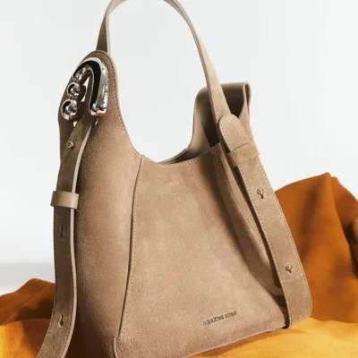 Luxury beige handbag with silver accents, stylish accessory for women, perfect for daily use or special occasions, from Monalisa Medical Store's fashionable collection.