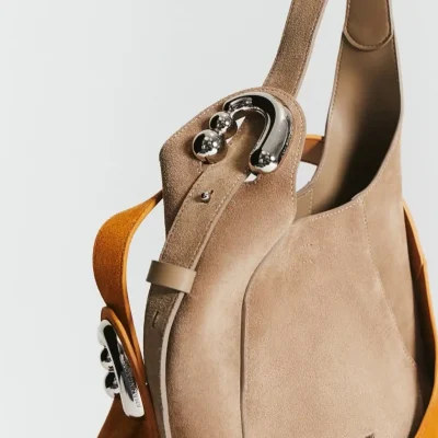 Luxury beige designer handbag with metal ball and hook hardware for women, stylish and trendy accessory, high-quality material, perfect for fashion-forward individuals, Monalisa Store.