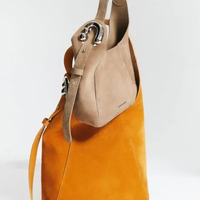 Luxury beige and orange leather tote bag with detachable beige shoulder strap, designed for stylish women, perfect for everyday use or travel, high-quality and fashionable.