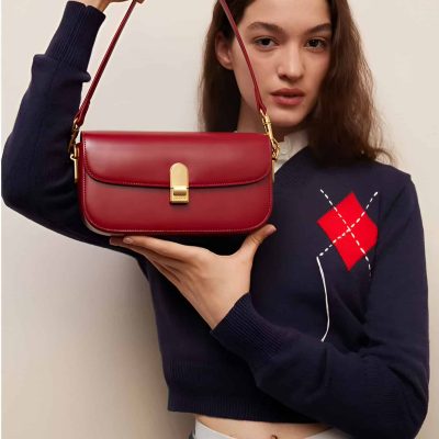 Elegant red designer handbag with gold hardware, perfect for enhancing your fashion statement. Ideal for women seeking luxury accessories at Monalisa Store.