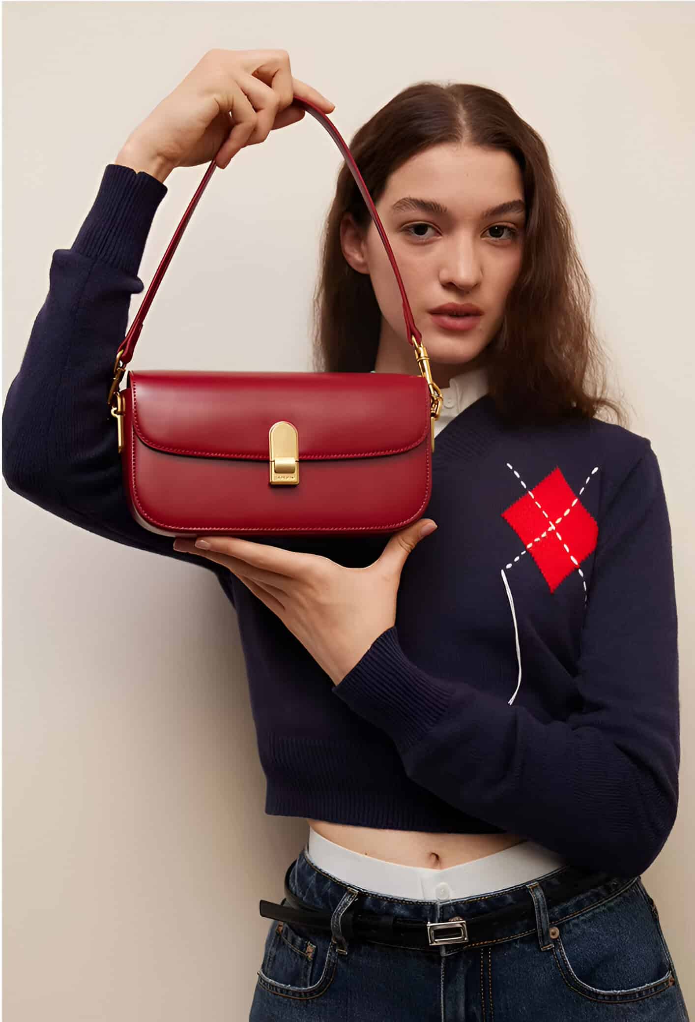 Elegant red designer handbag with gold hardware, perfect for enhancing your fashion statement. Ideal for women seeking luxury accessories at Monalisa Store.