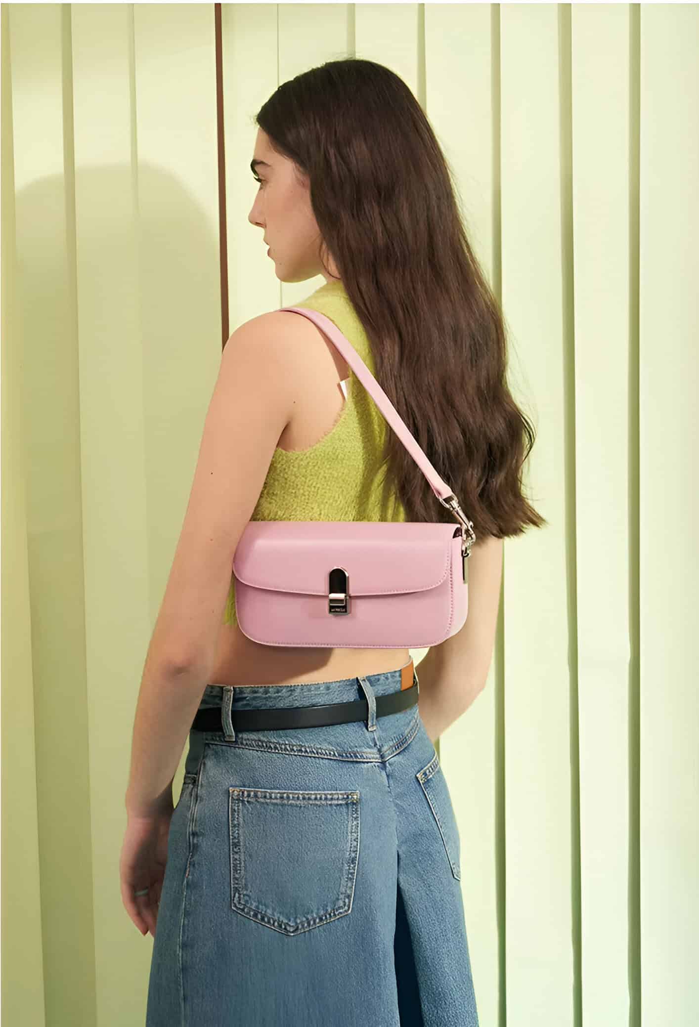 Pink leather shoulder bag with silver buckle, stylish accessory for women from Monalisa Store. Perfect for enhancing your everyday look with elegance and convenience.