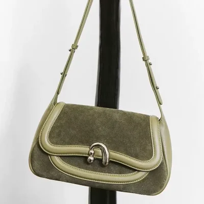 Elegant olive green and beige handbag with leather and suede details, perfect for fashion-forward accessories and stylish women’s handbags. Great for casual and formal outfits.