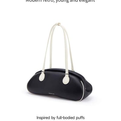 Elegant black and white puff bag with modern retro design, inspired by full-bodied puffs, perfect for stylish accessories.