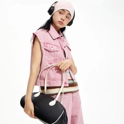 Versatile black and white carrying bag with ergonomic handles, perfect for fashion-forward women seeking stylish accessories at Monalisa Store.