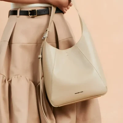 Beige handbag, elegant women's accessory, stylish leather purse for daily use, Monalisa Medical store fashion, sophisticated tote for women.