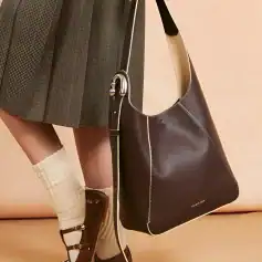 Luxurious leather tote bag with elegant stitching, stylish design, perfect for shopping and daily use, displayed alongside fashionable shoes, from Monalisa Store, a top destination for premium accessories.