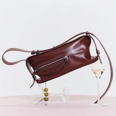 Sophisticated burgundy leather handbag with zippered pockets for women at Monalisa Store.