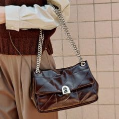 Luxury black quilted leather handbag with silver chain strap and clasp, stylish accessory from Monalisa Store for women’s fashion and designer bags.