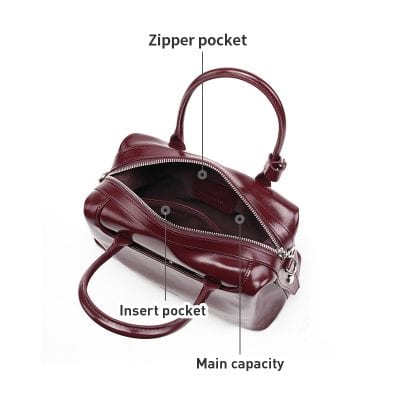 Leather handbag with zipper pocket, interior insert pocket, and ample main capacity, ideal for stylish women’s accessories and daily essentials.