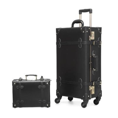 Luggage set with black suitcases, travel bags, and durable wheels suitable for frequent travelers and business trips.