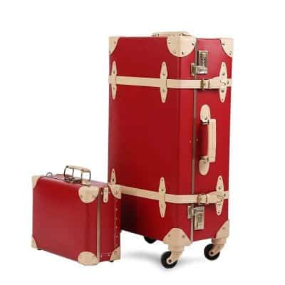 Spacious red and beige vintage-inspired travel luggage set with wheels and lock, perfect for stylish trips and airline carry-on.