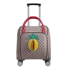 Monalisa store trendy rolled suitcase with colorful fruit patch design, durable wheels, and expandable compartments for travel and convenience.