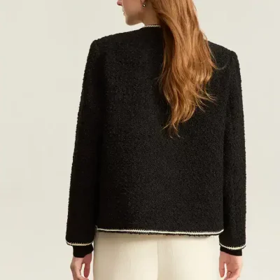 Elegant black textured blazer with white trim, perfect for sophisticated fashion statements and professional look. Monalisa Store offers stylish, high-quality women's clothing.