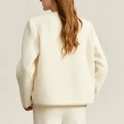 Elegant white textured knit sweater with a classic fit, paired with matching trousers, perfect for sophisticated office or casual wear, available at Monalisa Store.