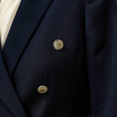 Shirt with decorative gold buttons, tailored for a professional look, featured on the Monalisa Store website, emphasizing premium quality dress shirts for men.
