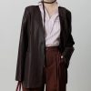 Leather blazer and chic office outfit, stylish professional fashion, Monalisa Medical store, elegant women's business attire, modern formal clothing for women, versatile office wear, high-quality fashion accessories, sophisticated professional look, contemporary women's style, fashionable work outfit for women.