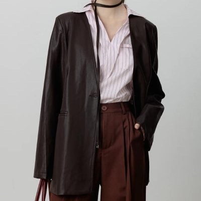 Leather blazer and chic office outfit, stylish professional fashion, Monalisa Medical store, elegant women's business attire, modern formal clothing for women, versatile office wear, high-quality fashion accessories, sophisticated professional look, contemporary women's style, fashionable work outfit for women.