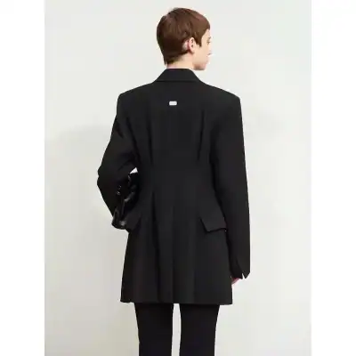 Sophisticated black tailored blazer with a sleek design, perfect for professional and stylish looks, ideal for optometry store fashion displays.