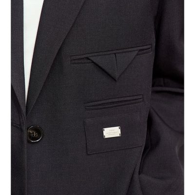 Elegant black suit jacket with stylish pocket details, tailored for professional and formal wear, available at Monalisa Store.