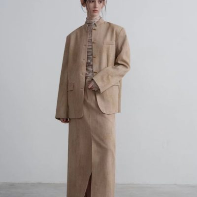 Elegant beige tailored suit for women, featuring a long skirt with a front slit and oversized blazer, perfect for professional or formal occasions at Monalisa Store.