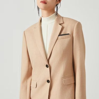 Elegant business woman in beige suit, professional fashion for office or formal occasions, Monalisa Store women's clothing collection, sophisticated corporate attire, high-quality tailored blazer.