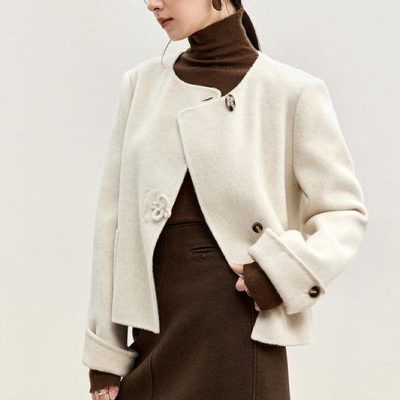 Modern woman's fashion with elegant cream jacket, stylish brown turtleneck, and fitted skirt, perfect for fall or winter wear. Explore Monalisa Store for trendy women's clothing and accessories.