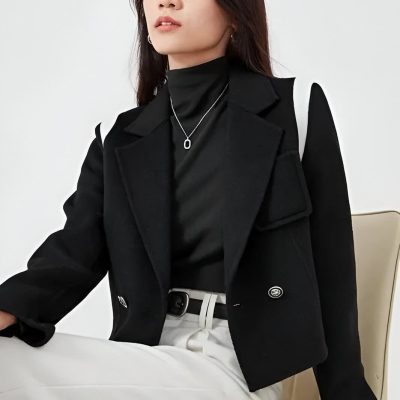 Elegant woman in stylish black blazer and accessories, showcasing modern fashion or professional attire, ideal for photo displays or promotional content for Monalisa Medical store.
