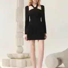 Elegant black cocktail dress with cut-out shoulders and ruched details for fashionable women, perfect for formal events or special occasions.