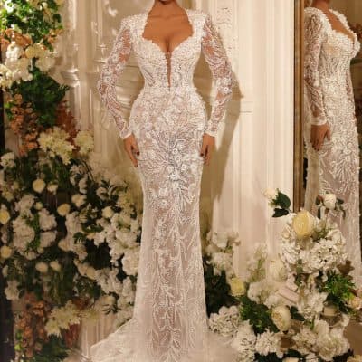 Luxurious white lace wedding dress with intricate embroidery, long sleeves, plunging neckline, and fitted silhouette perfect for bridal elegance and special occasions.