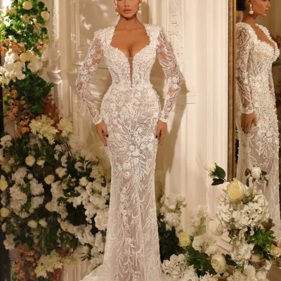 Elegant bridal gown featuring intricate lace embroidery and a fitted silhouette, perfect for weddings and special occasions. Monalisa Store offers luxurious wedding dresses with sophisticated designs and high-quality craftsmanship.