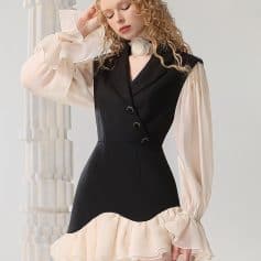 Elegant black and cream layered dress with ruffle accents, perfect for fashion-forward women looking for stylish, sophisticated clothing from Monalisa Store.