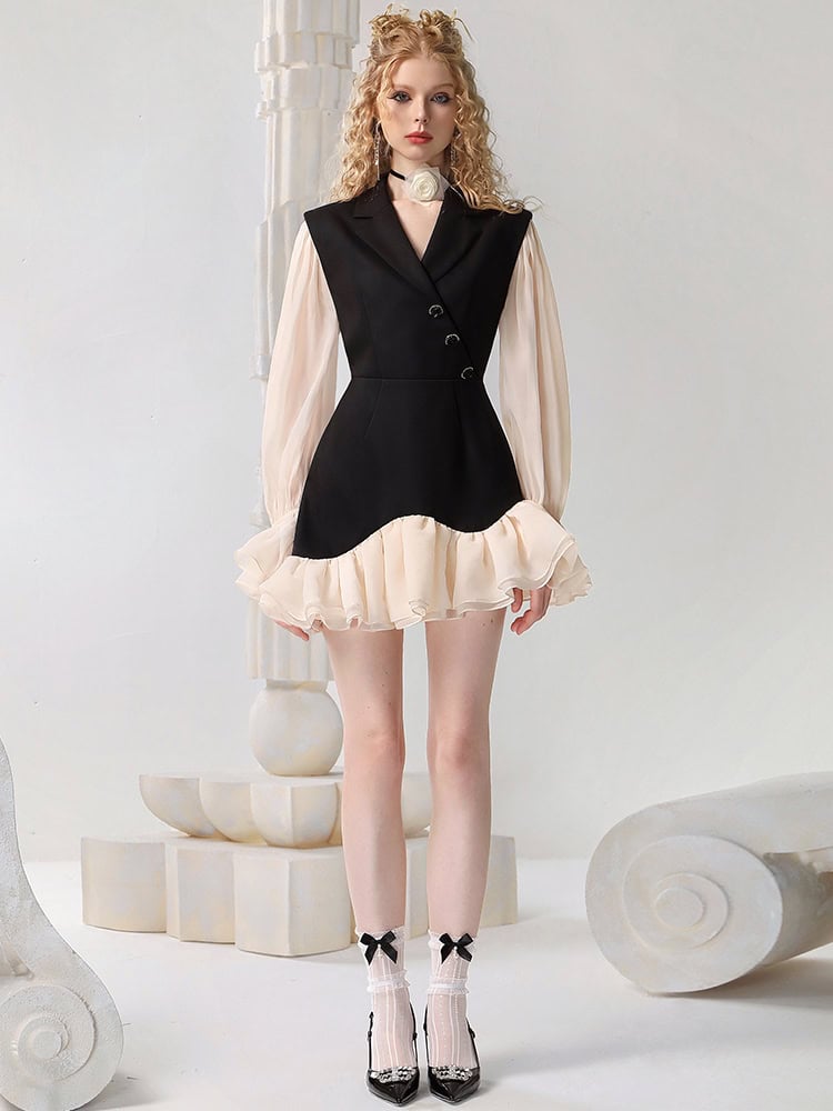 Elegant black and ivory ruffled dress with puffed sleeves, perfect for fashion-forward women. Features stylish details with a trendy, modern silhouette and eye-catching design, suitable for special occasions or fashionable outings.