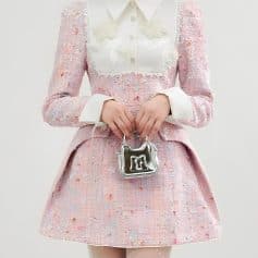 Pink and white stylish branded fashion outfit with a small silver handbag, perfect for luxury shopping and accessories at Monalisa Store.