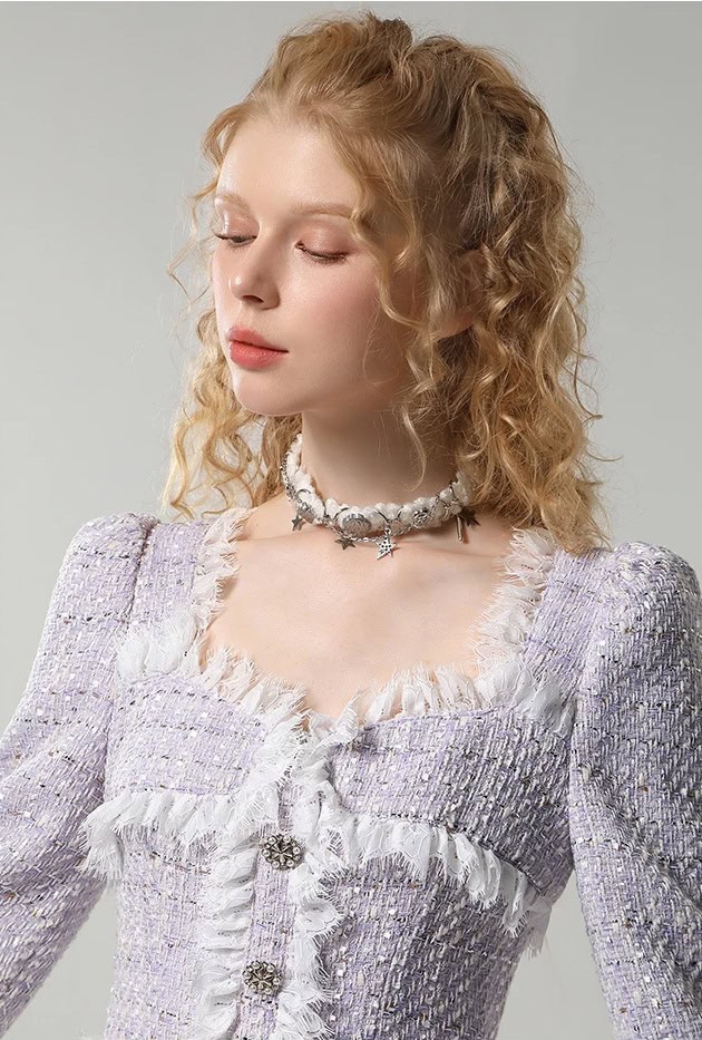 Elegant young woman wearing stylish designer clothing and accessories, showcasing fashion and beauty at Monalisa Store for premium opt quality.