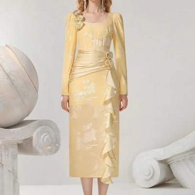 Elegant yellow traditional dress with floral accents, perfect for special occasions and cultural events. Stylish design featuring a fitted silhouette, ruffle detailing, and intricate fabric patterns.
