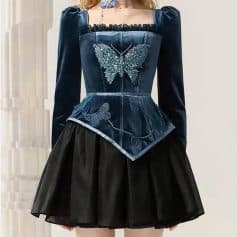 Butterfly embroidery silk blouse and black pleated skirt fashion outfit at Monalisa Store for elegant women.