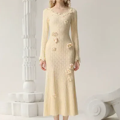 Elegant cream-colored dress with floral embellishments, perfect for formal occasions available at Monalisa Medical.