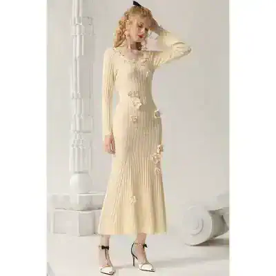 Elegant beige dress with floral embellishments, perfect for special occasions, designed for modern fashion enthusiasts.