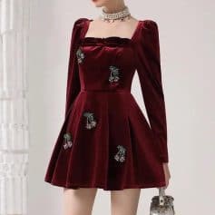Elegant burgundy velvet dress with floral embroidery, perfect for special occasions and evening wear at Monalisa Medical Store. Stylish, luxurious, and chic for modern fashion enthusiasts.